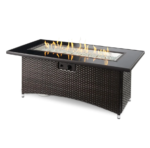 The Outdoor GreatRoom Company Montego 59-Inch Linear Propane Gas Fire Pit Table with Black Glass Top and Wicker Base