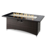 The Outdoor GreatRoom Company Montego 59-Inch Linear Propane Gas Fire Pit Table with Black Glass Top and Wicker Base